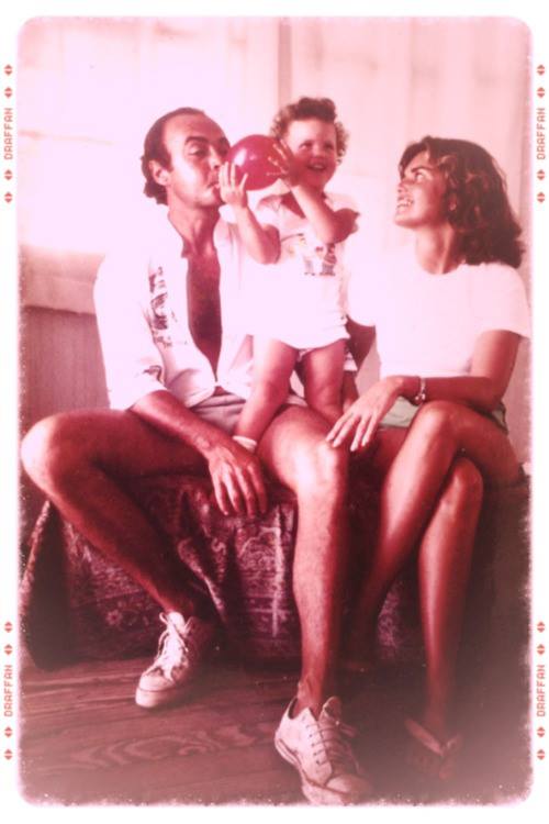 Raul Mendoza, Deborah Medley, and toddler Melodia sharing a playful family moment in Ecuador, reflecting the love, joy, and experiences that influenced Melodia's early years.