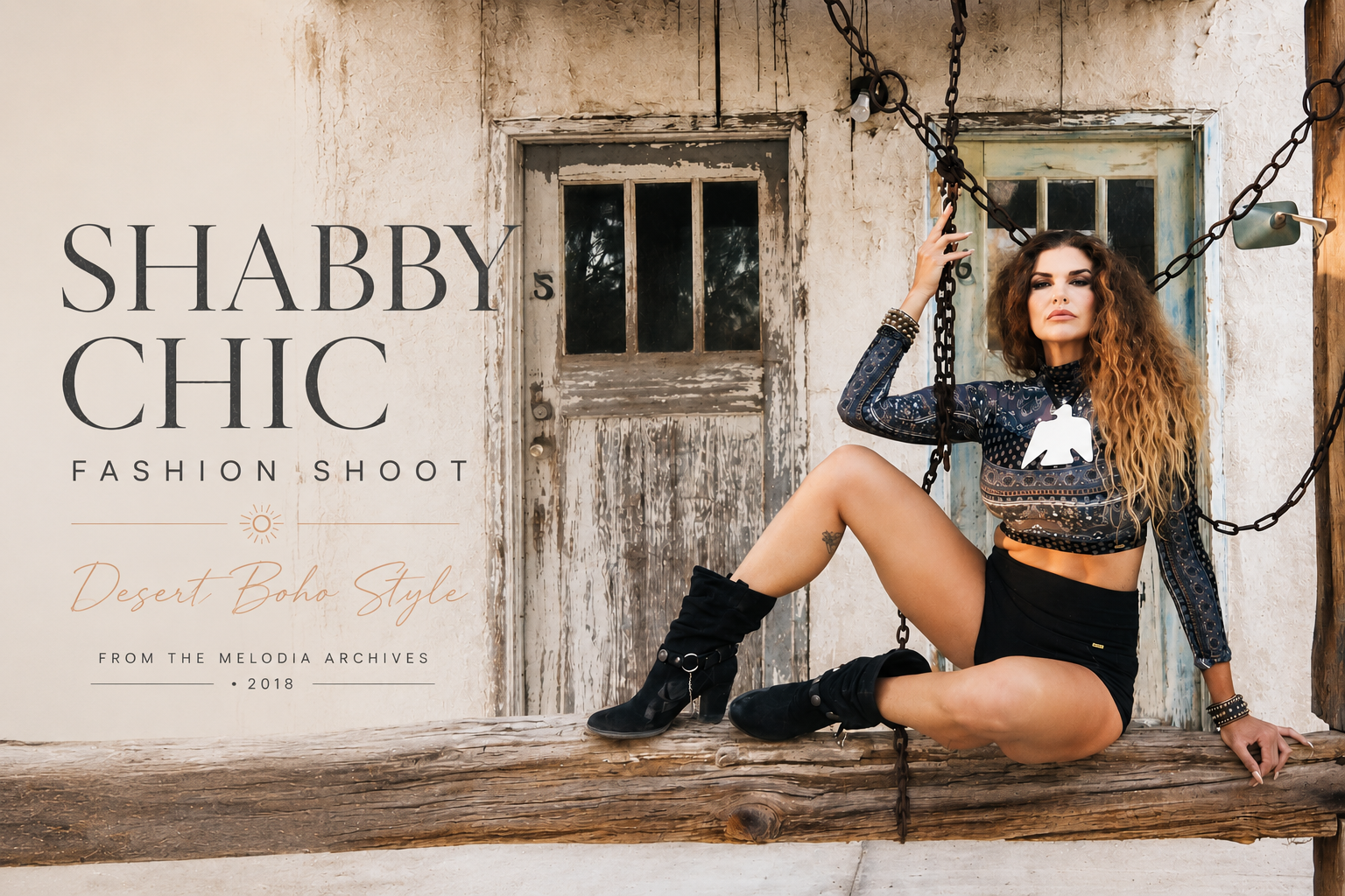 Boho desert fashion editorial featuring Melodia Medley in a patterned crop top and black moto shorts posed on a rustic wooden swing against a weathered desert backdrop.