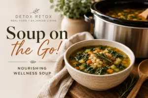Detox Retox wellness soup featured image with cozy crockpot vegetable soup, fresh herbs, and rustic kitchen styling promoting “Soup on the Go” nourishing wellness soup for busy travel days.