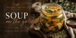 Detox Retox Soup on the Go featured image with nourishing homemade wellness soup in a glass jar, surrounded by herbs and rustic textures, alongside elegant typography promoting balanced living and cozy travel-day nourishment.