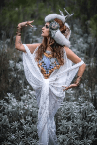 White assuit gown adorning a nature queen.