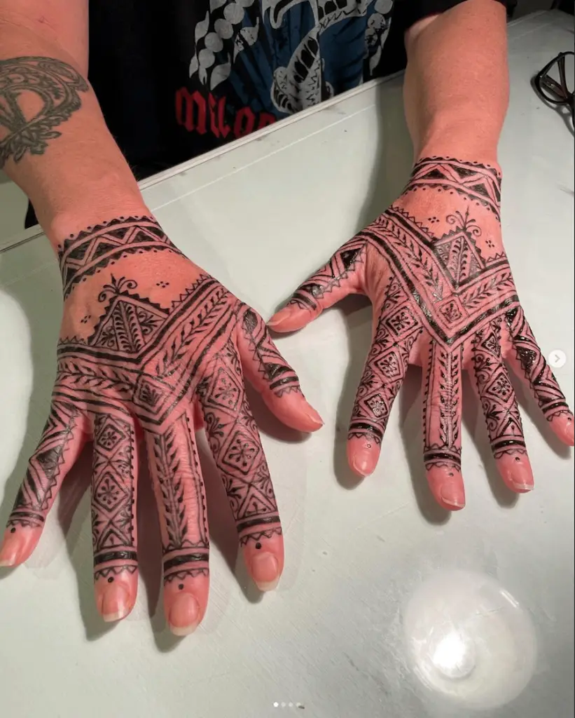 Jagua henna-adorned hands featured during the filming of the Detox Retox Easy Kimchee Recipe, highlighting artistry, self-expression, and the hands-on process of creating with intention.