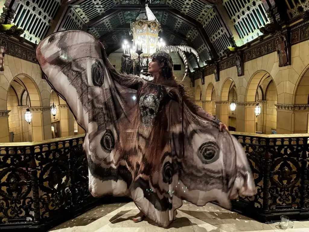 Melodia's Fantasy fashion look at the Labyrinth Masquerade Ball featuring dramatic death moth-inspired wings