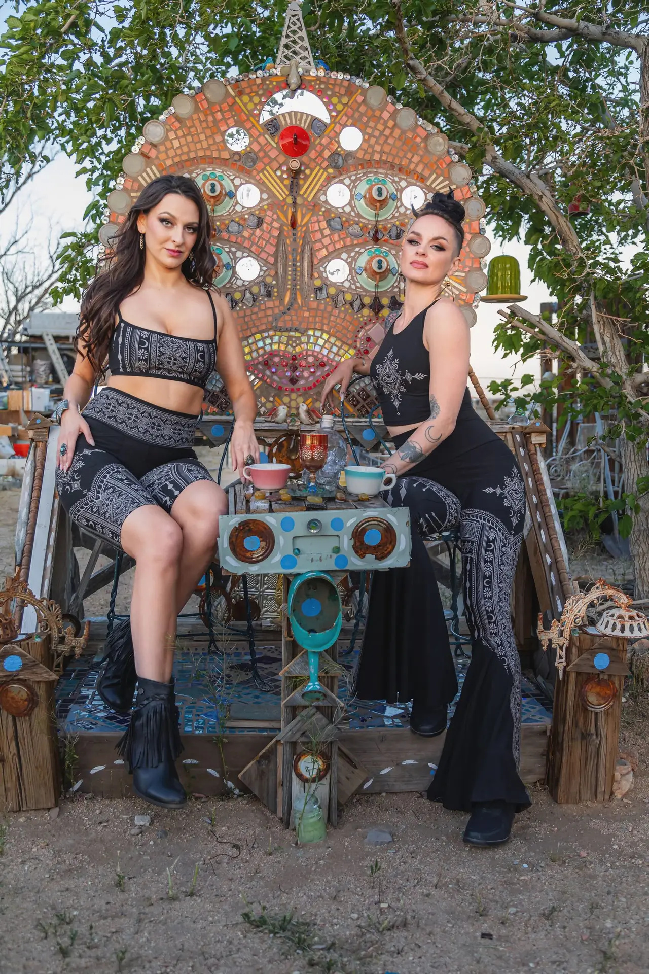 Models Bella & Tracy wearing Desert Dreams Collection outfits in desert-inspired setting