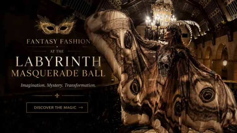 Featured image for Melodia Designs’ ‘Fantasy Fashion at the Labyrinth Masquerade Ball’ blog post featuring a model in an elaborate moth-inspired masquerade gown inside a grand gothic ballroom, with dramatic wings, ornate headpiece, and cinematic golden lighting.