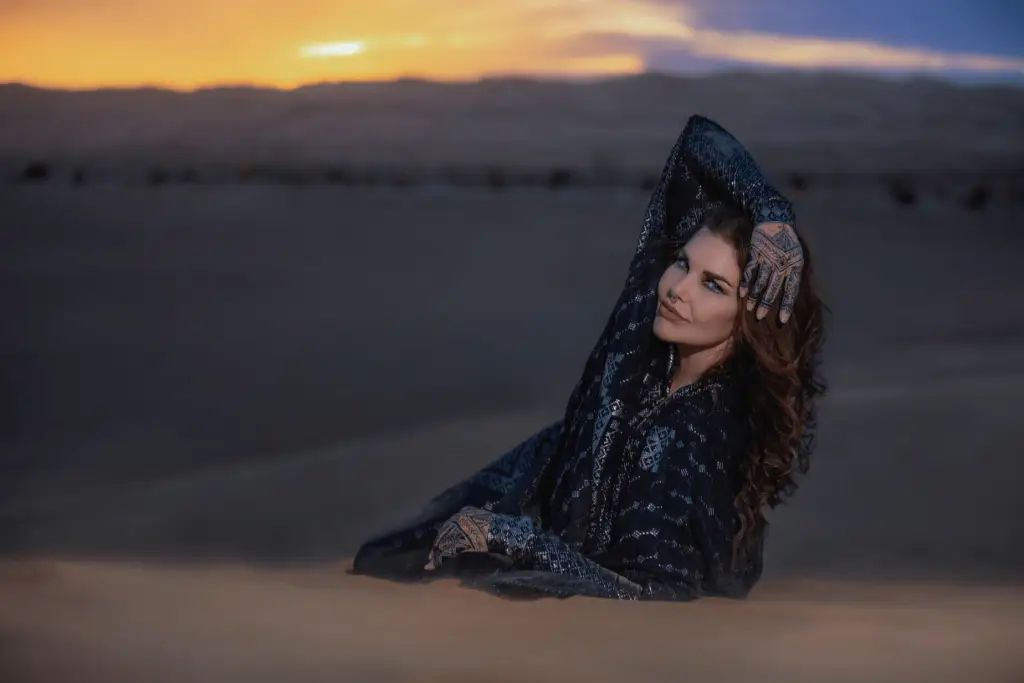 Melodia Designs fabrics featured in eco-luxe designer gown at desert sunset.