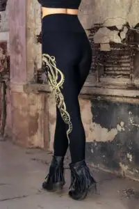 Side view of black Serpent Elsa leggings with gold sacred geometry artwork