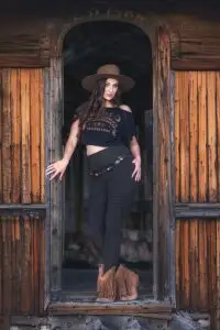Woman wearing OUIJA Dede crop top with Rustique Moto leggings outfit by Melodia Designs