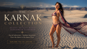 Featured banner for the Karnak Collection by Melodia Designs, featuring a woman in flowing purple desert-inspired dancewear standing barefoot on white sand dunes beneath a dramatic blue sky.